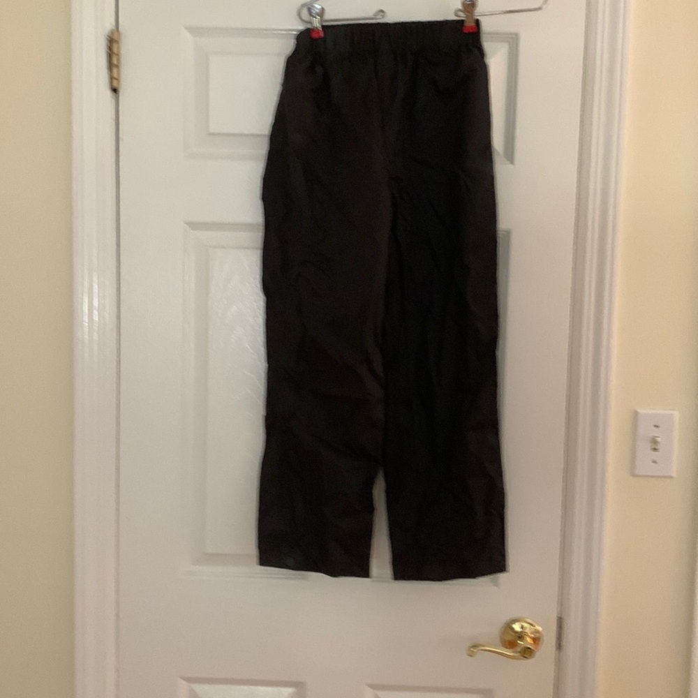 Children’s size medium rain pants with optional snaps on legs